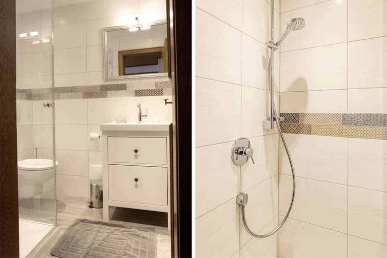 Modernes Bad mit ebenerdiger Dusche, Waschtisch und WC in der Pension Forsthof Maishofen